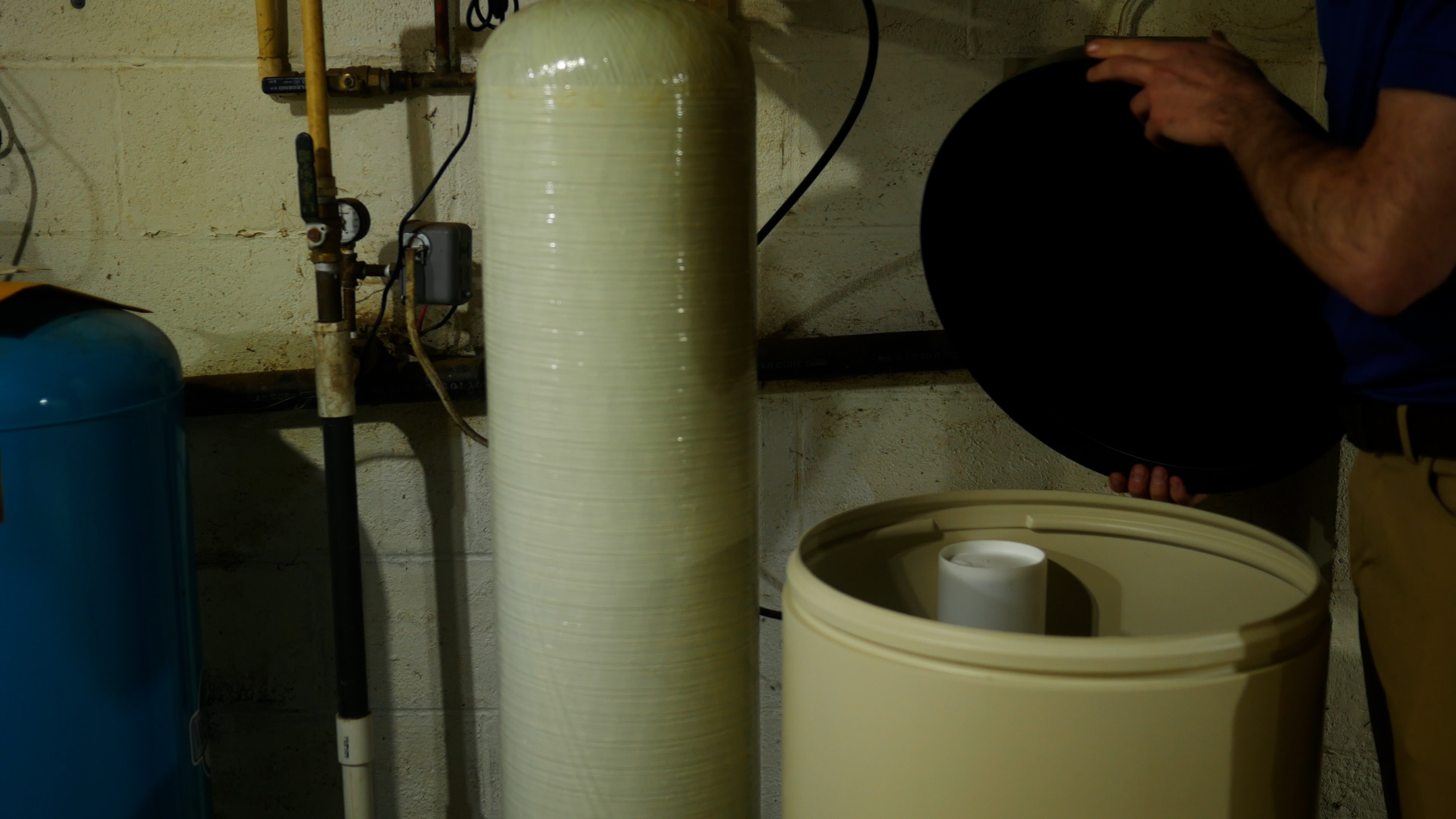 Water softener resin tank and brine salt tank — standard treatment setup for hard water in Amarillo